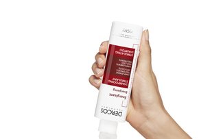 USING DERCOS ENERGY+ STIMULATING SHAMPOO